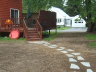 lawn seeding blue stone walk way